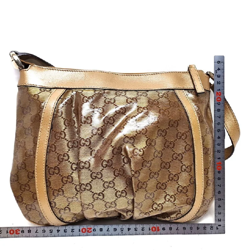 Women Gucci bags with a zip - around closure for securityGucci Gold Coated Canvas Crossbody Bag