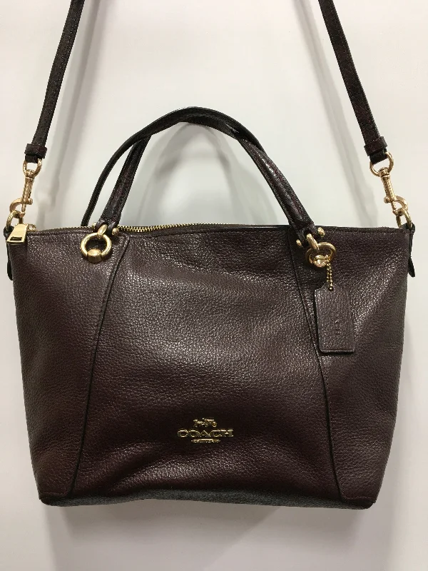 Coach Rogue bags with a monogram - embossed leather surfaceHandbag Designer By Coach, Size: Medium