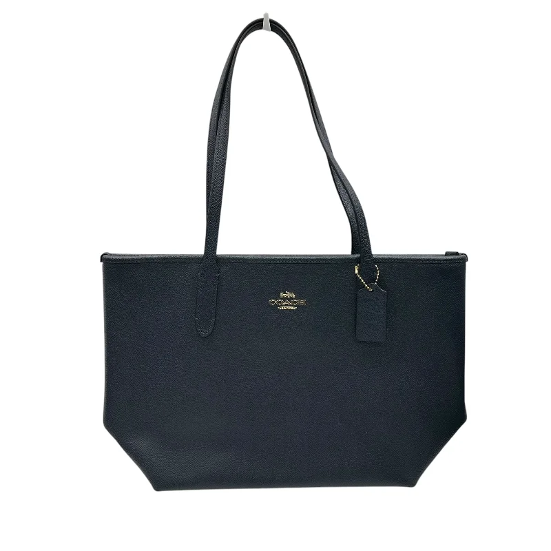 Coach tote bags with a double - handle and shoulder - strap option for easy useTote Designer By Coach In Navy, Size:Medium