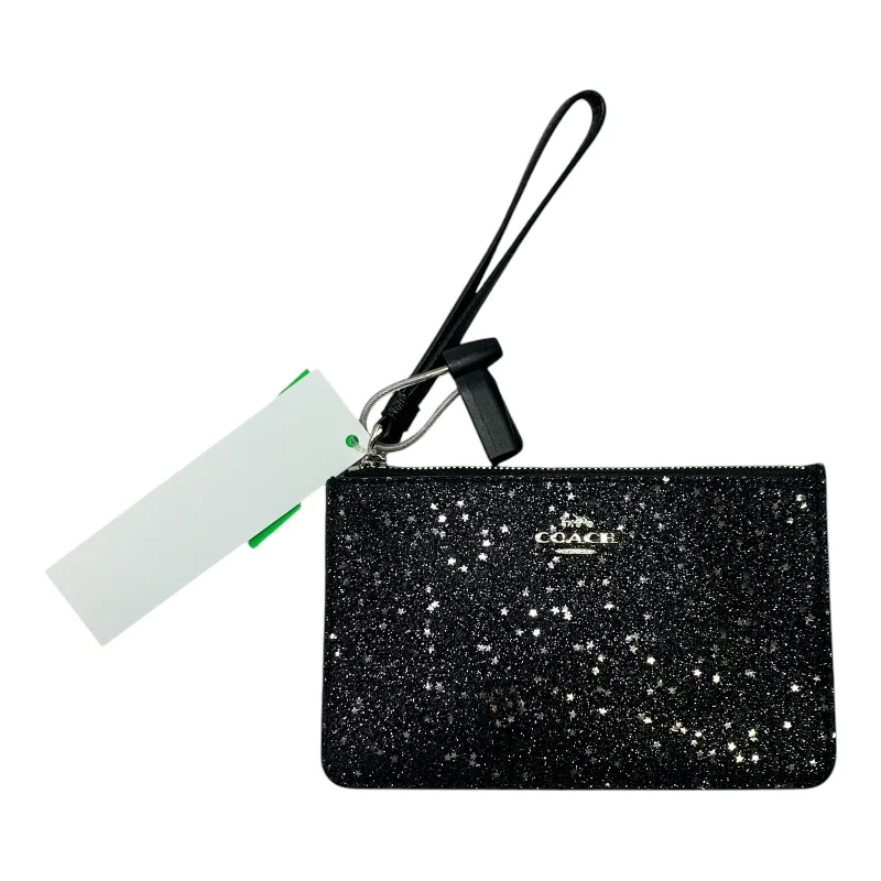 Ladies Coach Tabby bags with a textured leather surface for a more tactile lookWristlet Designer By Coach, Size: Small