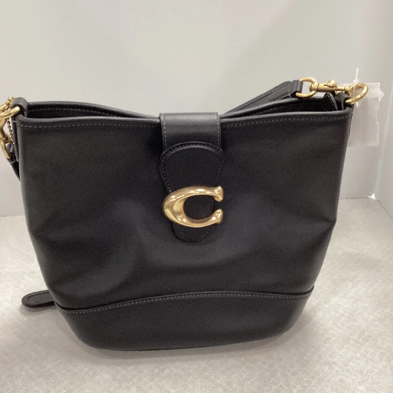 Coach Dempsey bags with a large capacity and a drawstring closureHandbag Designer By Coach, Size: Medium