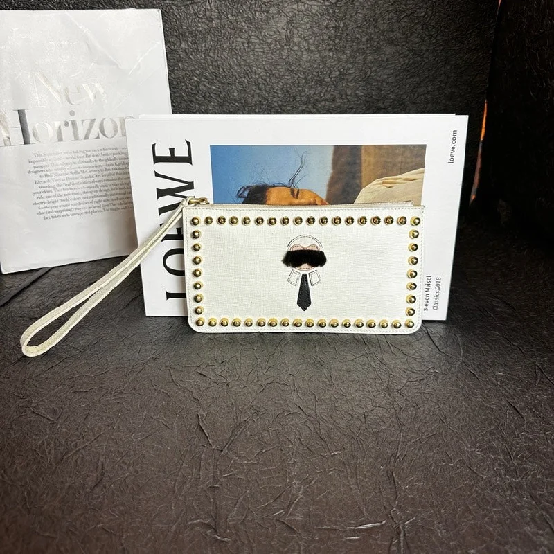 Small - sized Fendi crossbody bags in smooth calfskin leather for a compact and stylish carryFendi Karl Lagerfeld White Rivet Clutch Bag 30cm