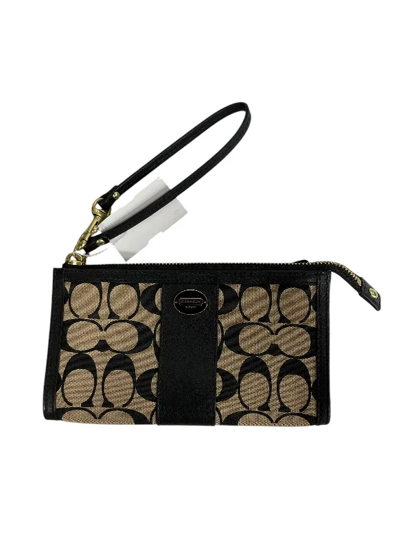 Ladies Coach Tabby bags with a textured leather surface for a more tactile lookWristlet Designer By Coach, Size: Medium