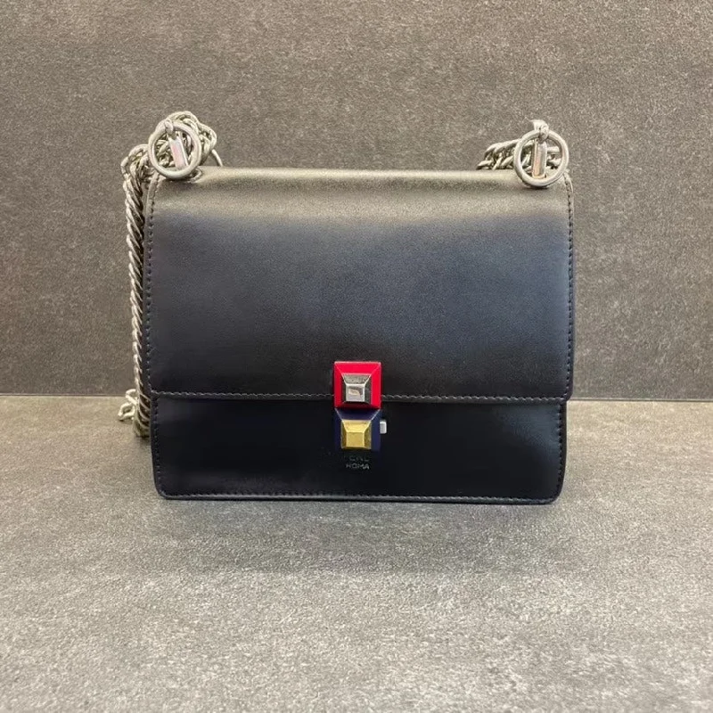 Fendi Baguette bags featuring the iconic FF logo plaque for a branded lookFendi Kan I Black Leather Crossbody Bag Medium