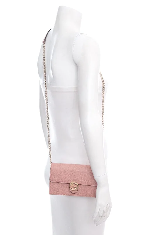 Women Gucci Sylvie bags featuring the signature web stripeGucci Pink Leather Interlocking G Cross-Body