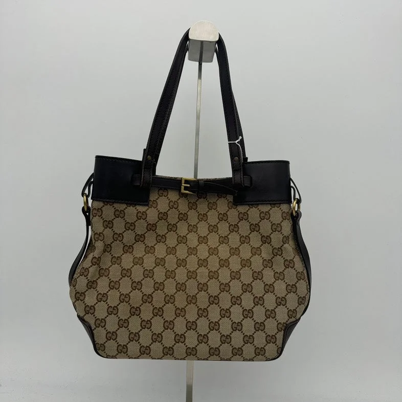 Women Gucci bags with interlocking G hardware for a classic lookGucci Canvas Beige Brown Monogram Shoulder Bag Medium