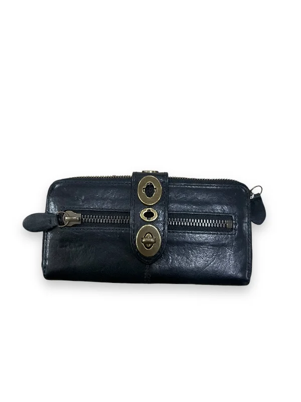 Coach bags with a zippered interior pocket for separating itemsWallet Designer By Coach, Size: Medium