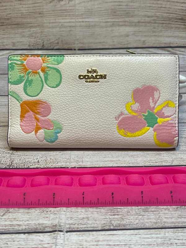 Coach crossbody bags with a printed floral pattern for a feminine touchWallet Designer By Coach, Size: Large