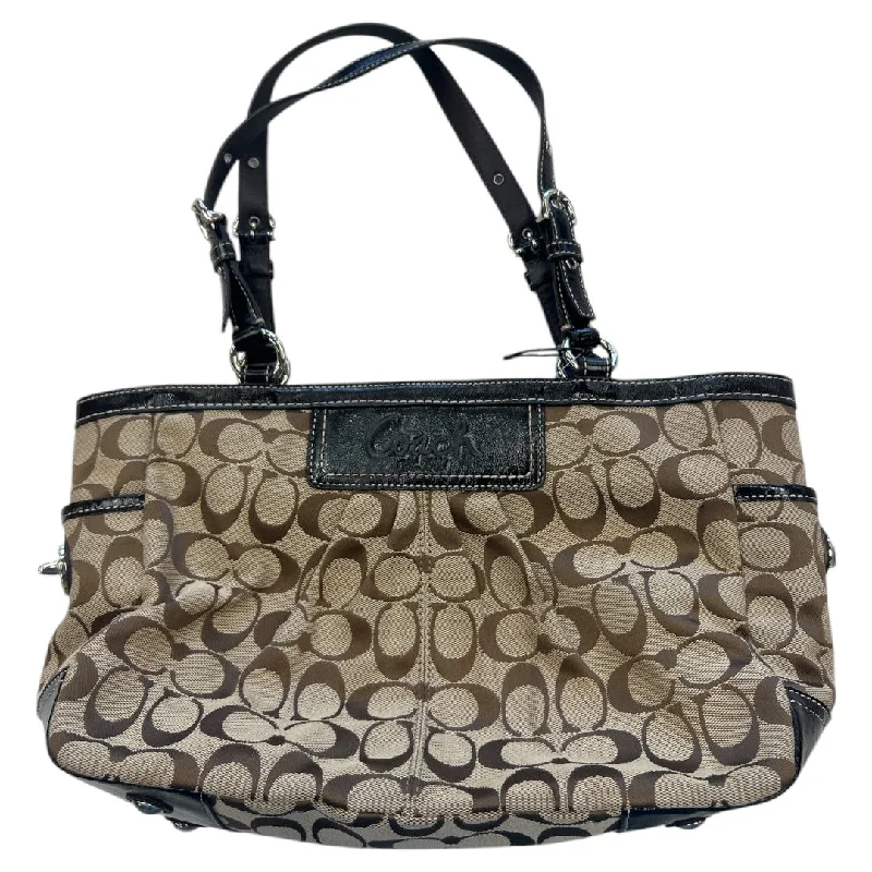 Coach Rogue bags with a monogram - embossed leather surfaceHandbag Designer By Coach, Size: Medium