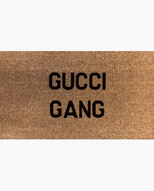 Ladies Gucci shoulder bags with a tassel decorationGucci Gang Doormat