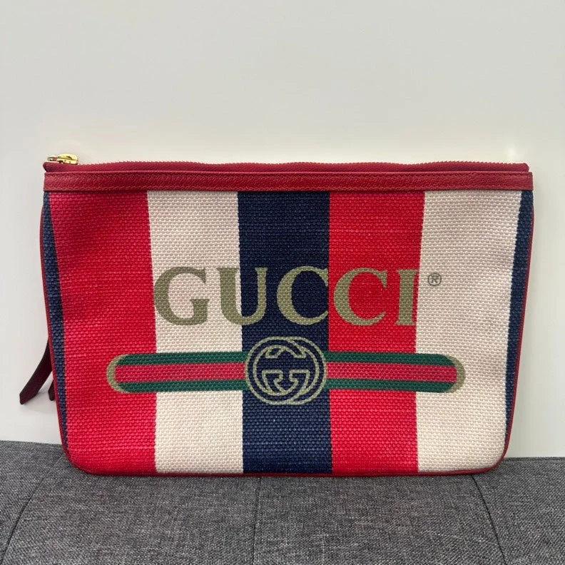 Women Gucci crossbody bags with a keychain holderGucci Canvas Leather Clutch Red, White, Blue Stripes 8"x11" Zipper Closure Clutch Bag