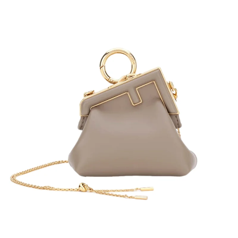 Fendi bags with a detachable makeup pouch inside for beauty - conscious usersFendi First Tortora Gray Leather Nano Micro Charm Pouch Bag