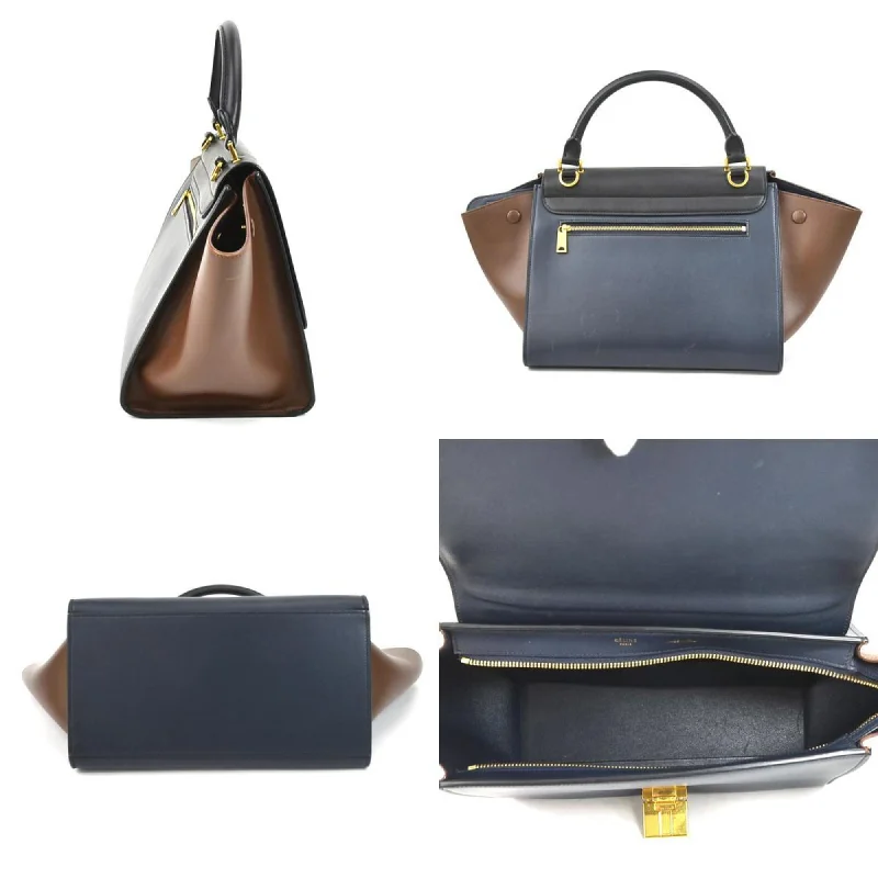 Two - Tone Celine Bags for a Modern and Stylish AppearanceCeline handbag shoulder bag trapeze leather black/navy/brown gold ladies