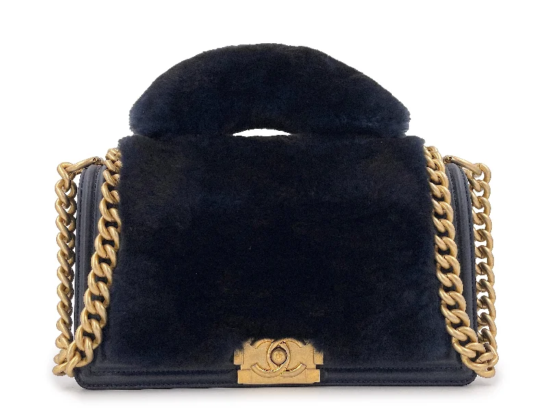 Chanel Quilted Leather Shoulder Bag for FashionistasChanel Fur Boy Handle Flap Bag Blue Black Medium GHW