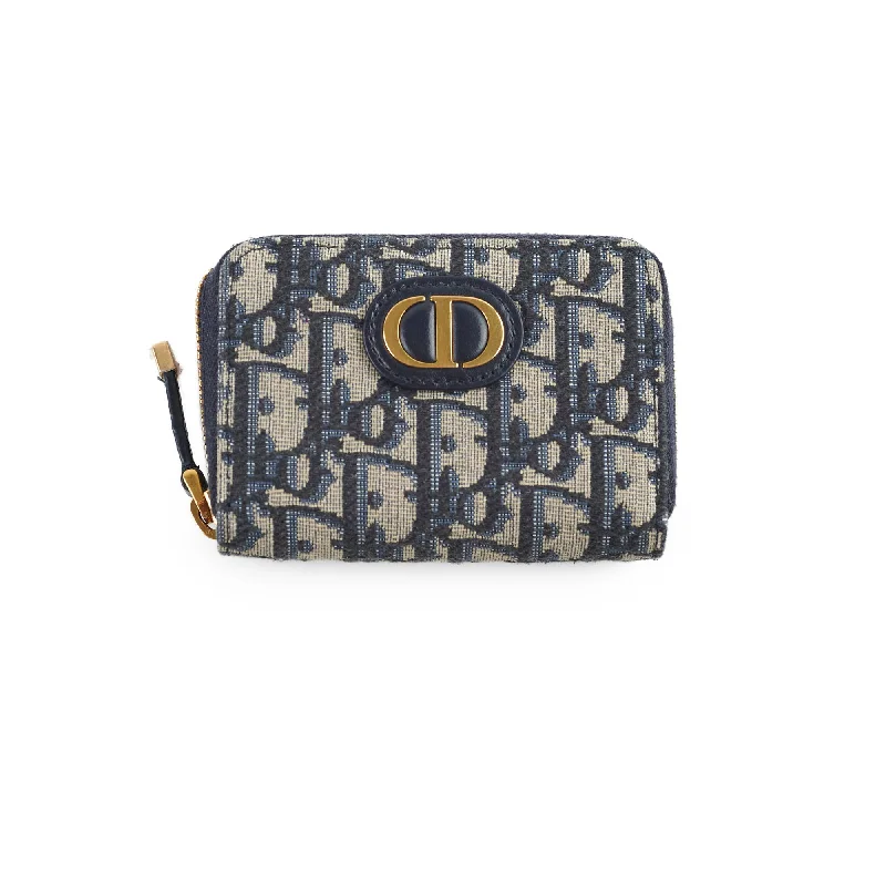 Trendsetting Christian Dior crossbody bags with a colorful strapChristian Dior Small 30 Montaigne Voyageur Coin Purse