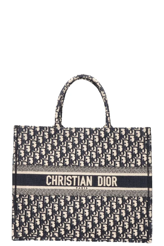 Christian Dior Saddle bags with a studded trim for a bold lookCHRISTIAN DIOR Book Tote Large Oblique Blue