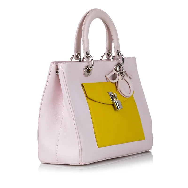 Christian Dior backpacks with a sleek, minimalist silhouetteDior Diorissimo Pocket Tote (SHG-37749)